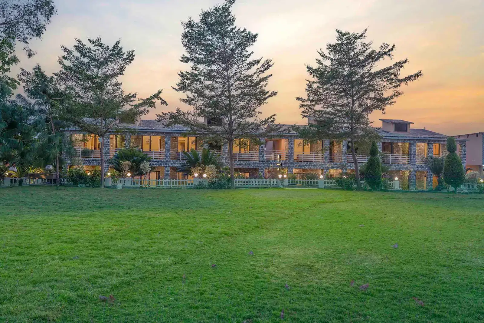 The Banyan Retreat facade at sunset, Jim Corbett